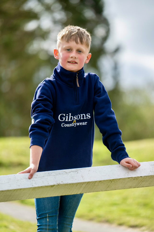 Tommy wearing ‘Gibsons Country Wear’ Navy Sweatshirt